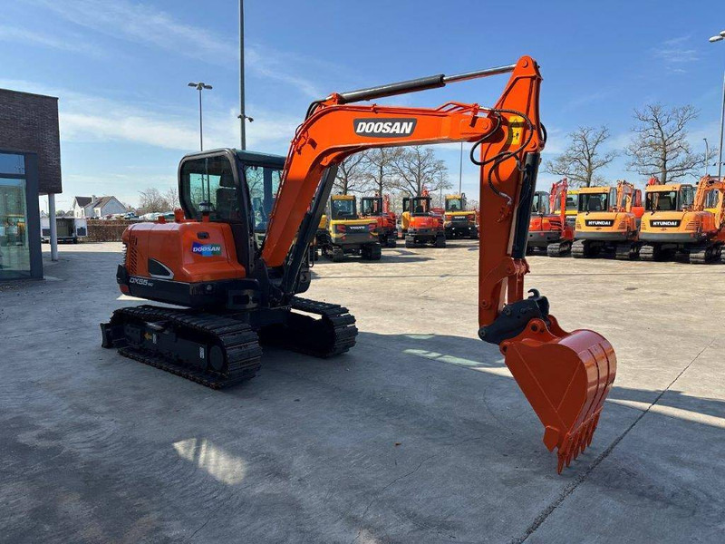 Doosan DX55-9C - Гусеничный экскаватор: фото 3 Doosan DX55-9C - Гусеничный экскаватор: фото 3
