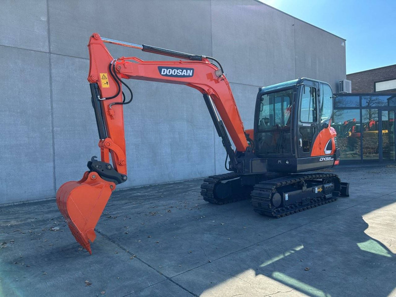 Doosan DX55-9C - Гусеничный экскаватор: фото 1 Doosan DX55-9C - Гусеничный экскаватор: фото 1