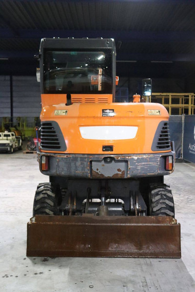 Doosan DX55WK - Колёсный экскаватор: фото 4 Doosan DX55WK - Колёсный экскаватор: фото 4