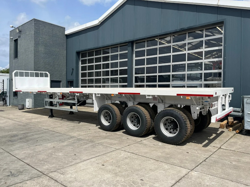 CIMC 3-axle Flatbed Semi-Trailer - Полуприцеп бортовой/ Платформа: фото 4 CIMC 3-axle Flatbed Semi-Trailer - Полуприцеп бортовой/ Платформа: фото 4